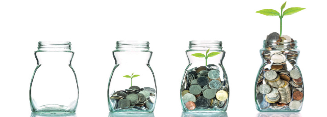 Coins_in_a_jar_growing
