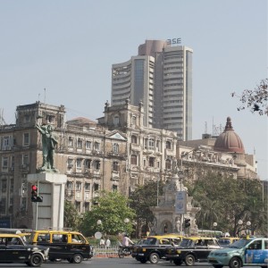 The Bombay Stock Exchange (BSE) building stands tall over Mumbai's colonial-era architecture.