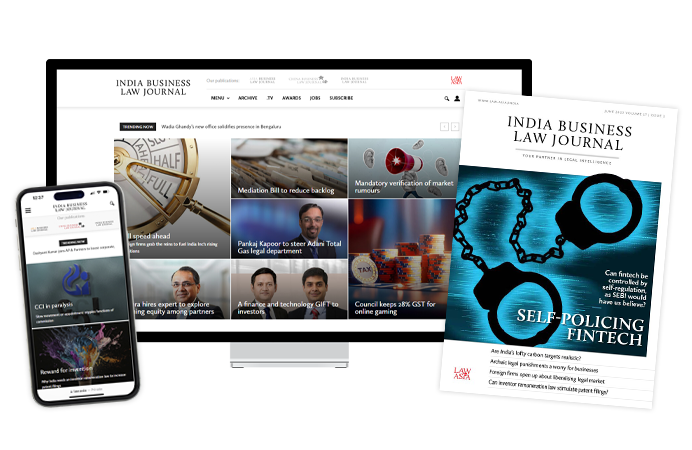 A phone on the left and a monitor in the middle with screenshots of the India Business Law Journal website, with a magazine cover of one of the India Business Law Journal issues on the right