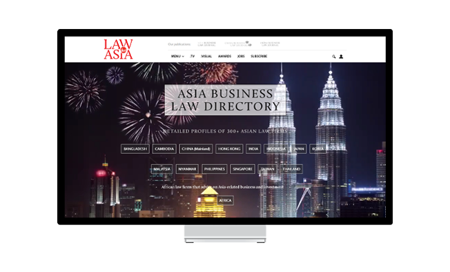A monitor with a screenshot of the Asia Business Law Directory web page